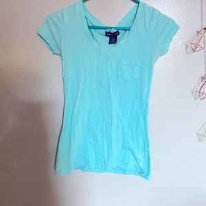 Wet seal turquoise tshirt with pocket.
